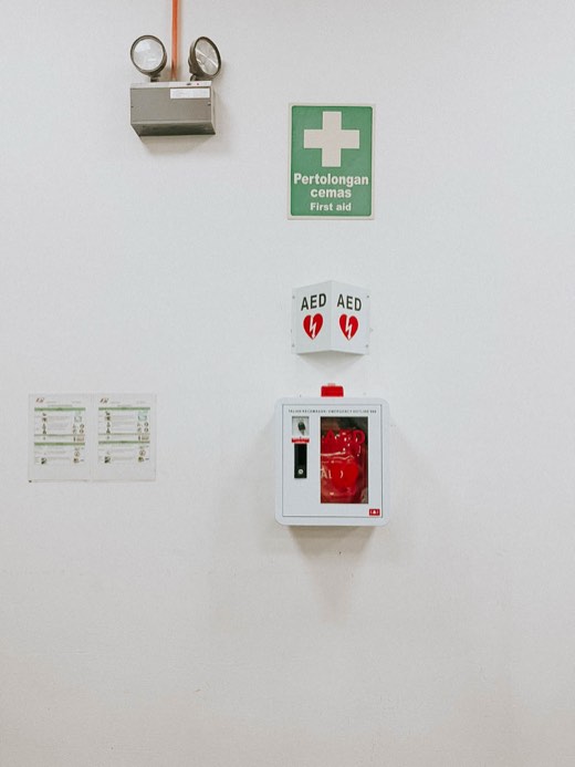 MYHeart AED in a wall cabinet with AED signage, installed on site