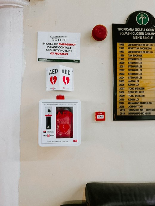 MYHeart AED in a wall cabinet with AED signage, installed on site